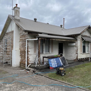 Weatherboard house before painting exterior